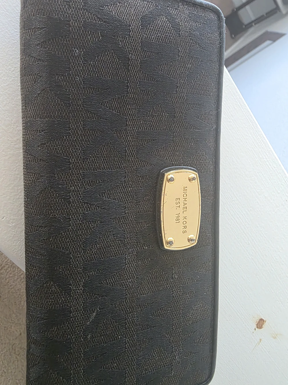 Michael Kors Black and Gold Logo Zip Around Wallet